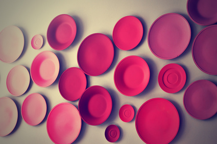 Colorful plates hanging on a wall